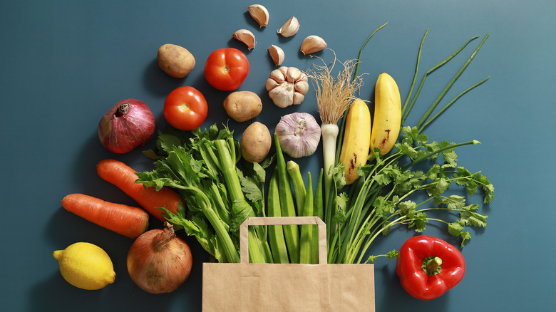 bag with fresh produce spilling out