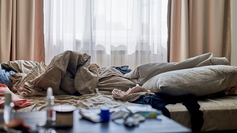 A cluttered bedroom