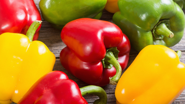 Green, red, and yellow bell peppers