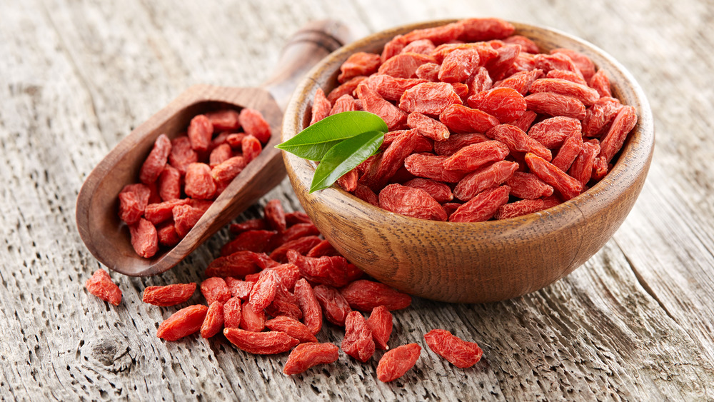 Goji berries in a wooden bowl