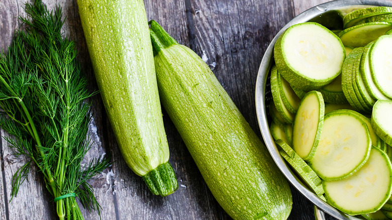 Whole and sliced zucchini 