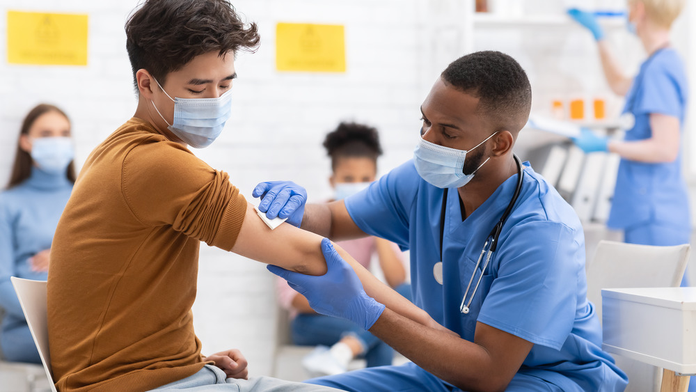 Stock photo of a man receiving a vaccine