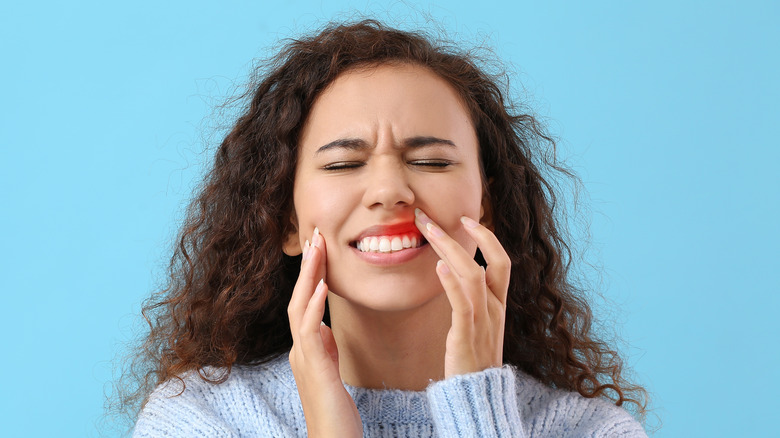woman with mouth pain 