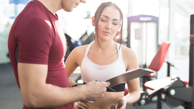 signing a contract at the gym