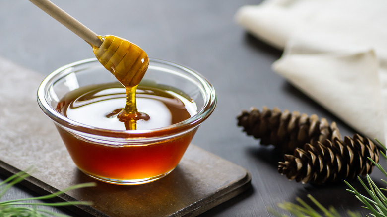 honey in a bowl on a table 