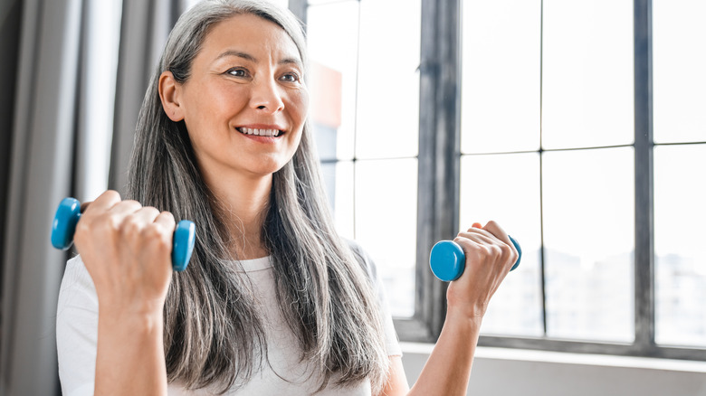 woman lifting weights