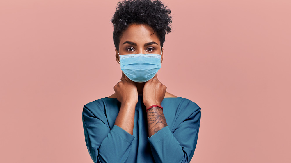 woman nervous over vaccine pause