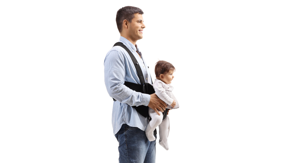 An average looking male walking with his child 