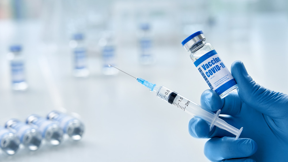 Young man getting the COVID-19 vaccine