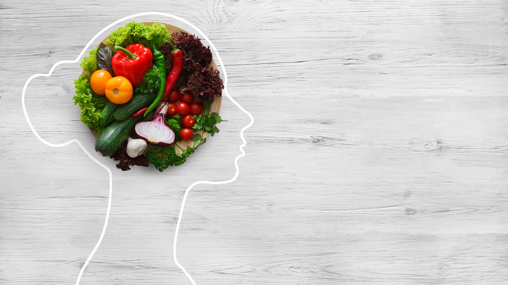 Vegetables inside outline of head