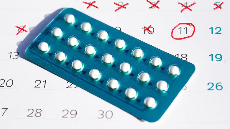 Birth control on top of calendar