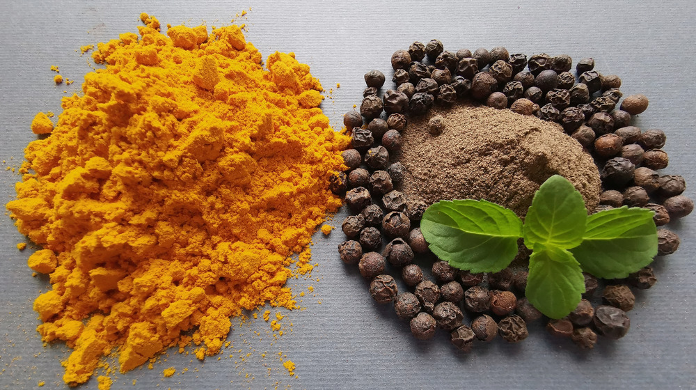 Turmeric and black pepper in piles 