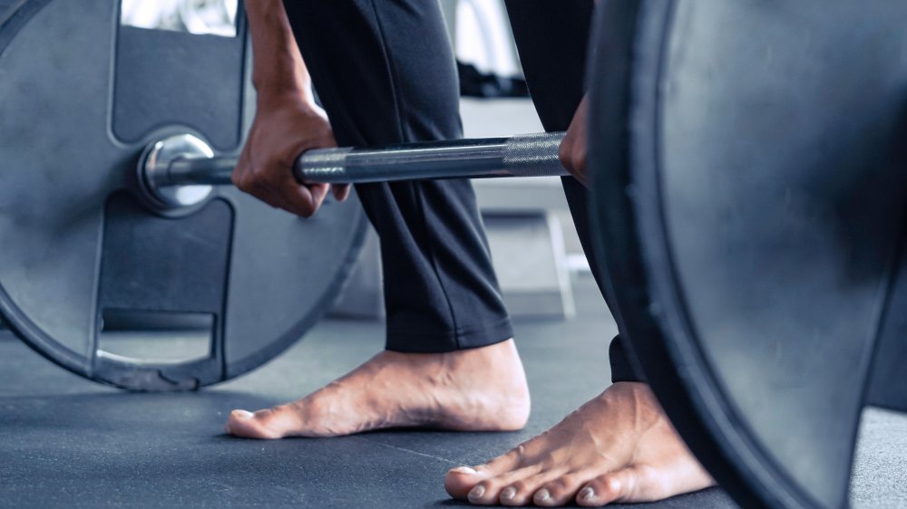 Barefoot weight lifter