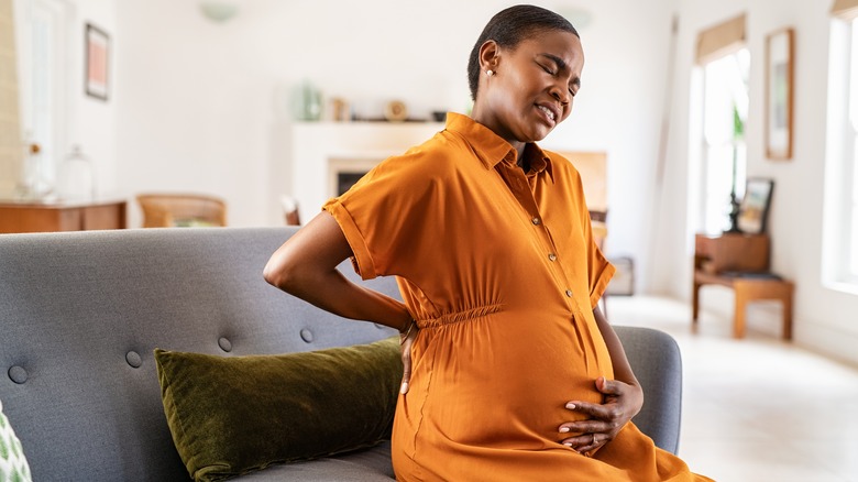 Pregnant person in stomach pain