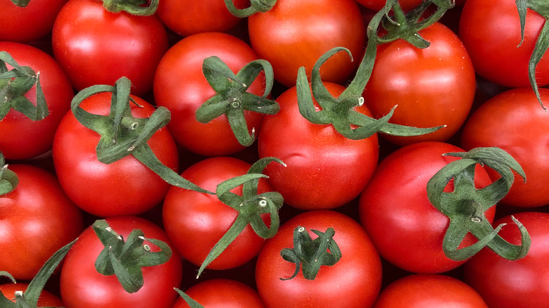 A large pile of tomatoes