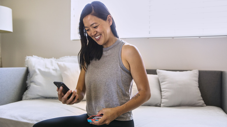 Woman checking blood sugar level
