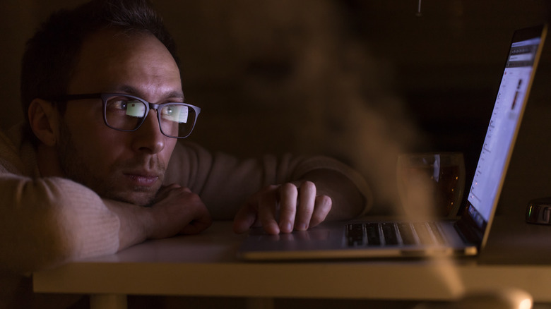 Man with computer and humidifier
