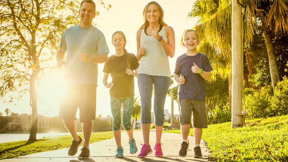 family going on run together
