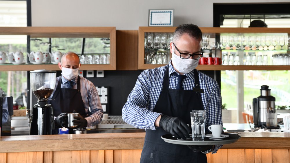 restaurant server wearing mask