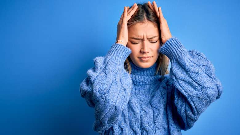 woman experiencing tension and stress