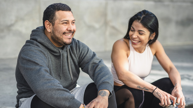 Woman and man sitting together 