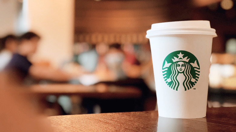 Starbucks cup on table 
