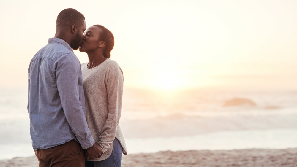 Balck couple kissing