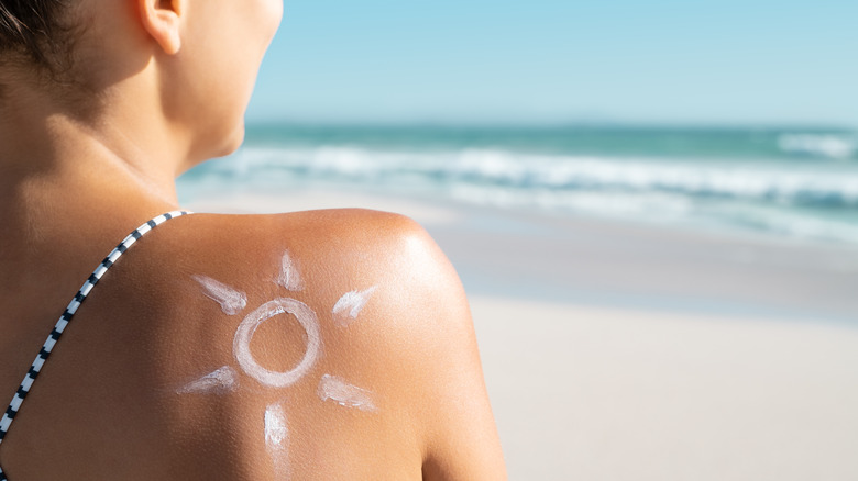 woman taking the sun at the beach