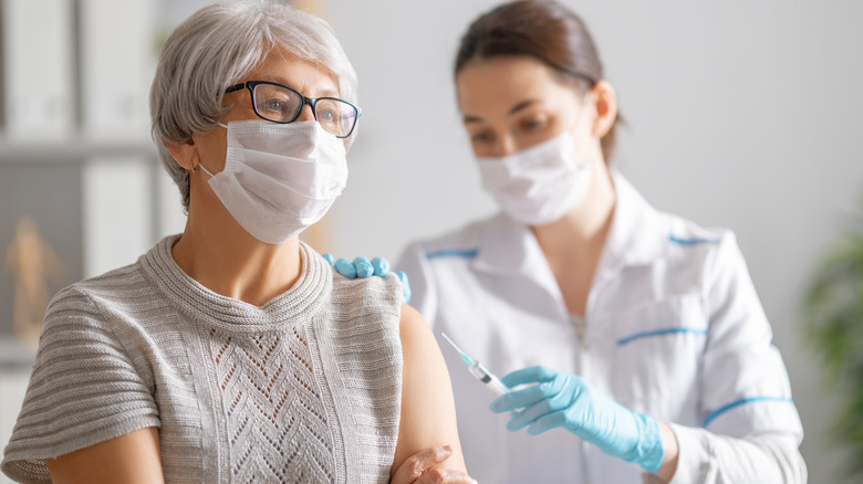 woman getting vaccinated