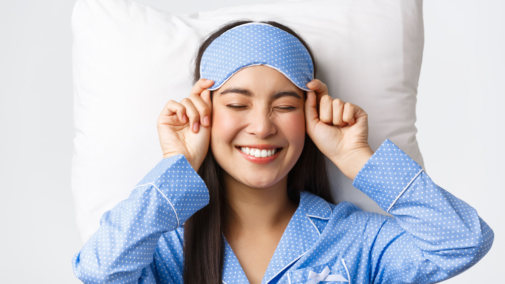 woman waking up happy