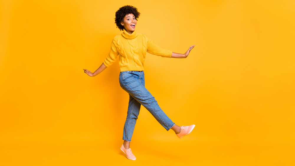 Woman in front of monochrome background