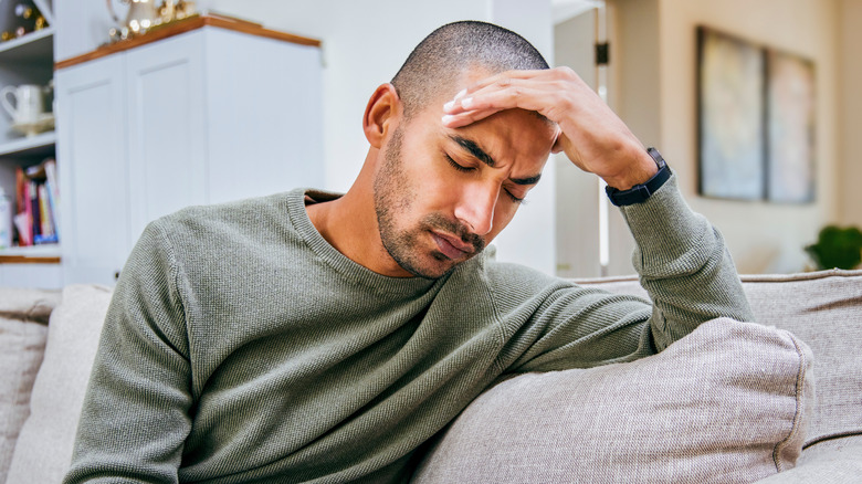 man suffering from a tension headache