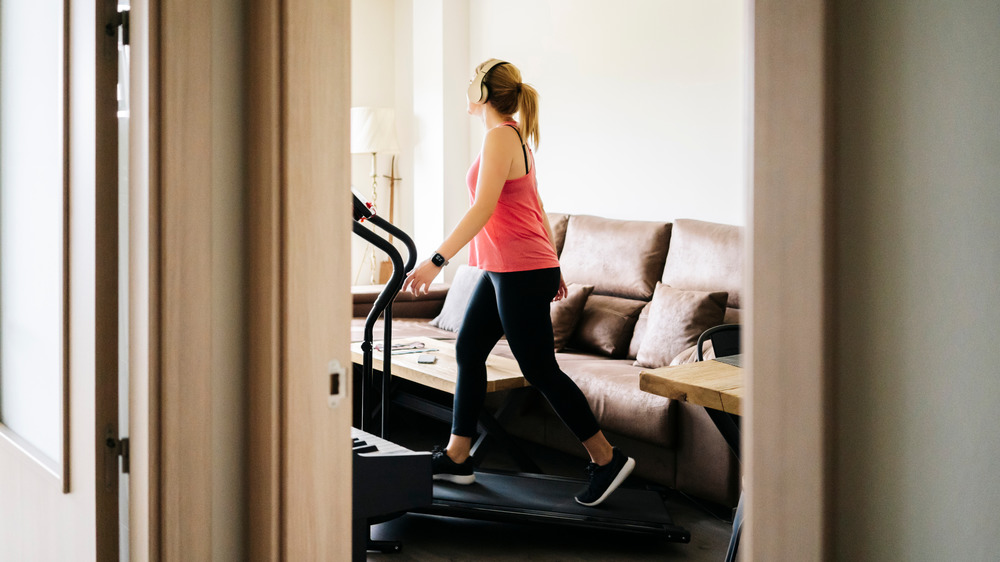 Woman walking on treadmill