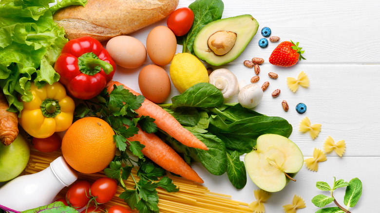 Fruits and vegetables on a white wood table