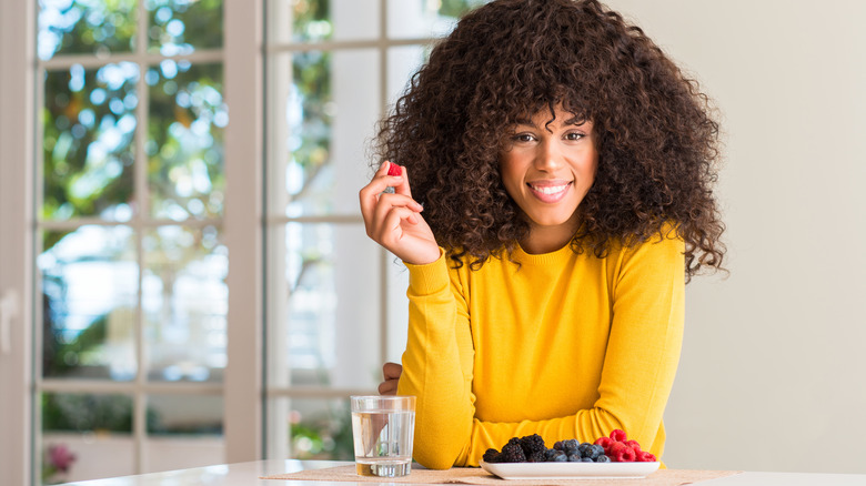woman with plate ofberries