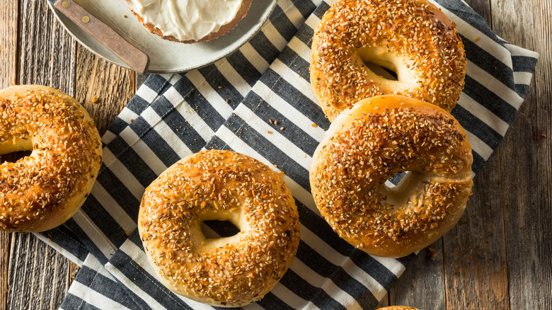 overview of everything bagels on a wooden table 