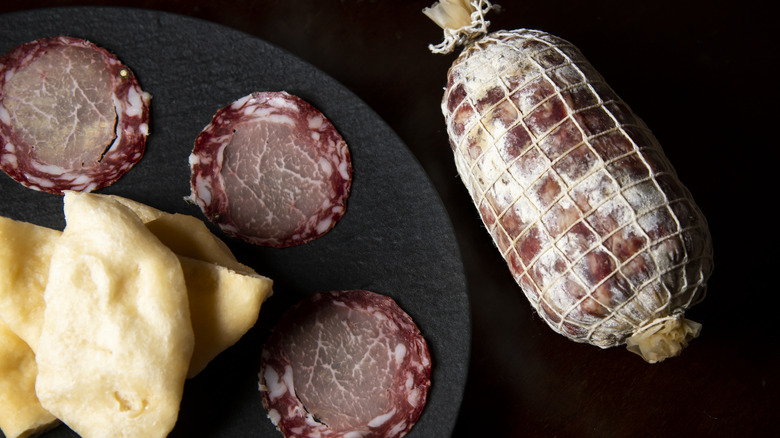 Salami meats with surface mold