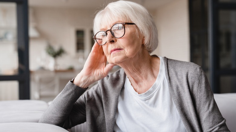 Woman with head pain