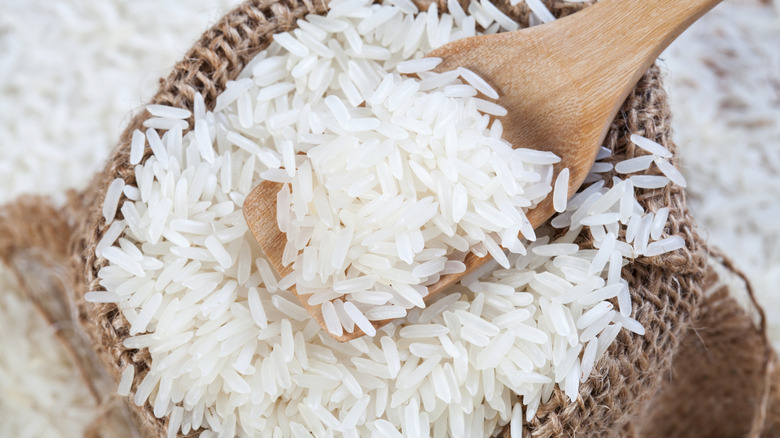 rice in a wooden spoon