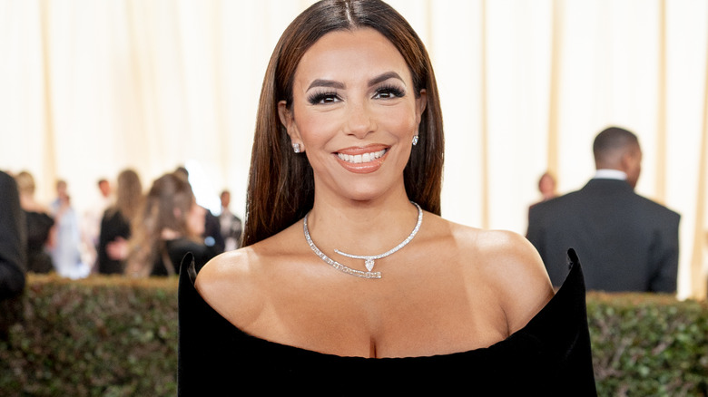 Eva Longoria smiling on red carpet