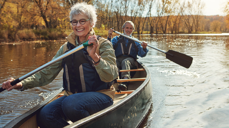 older couple in a canoe