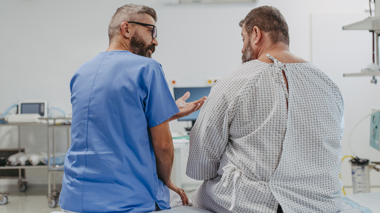 overweight patient with doctor
