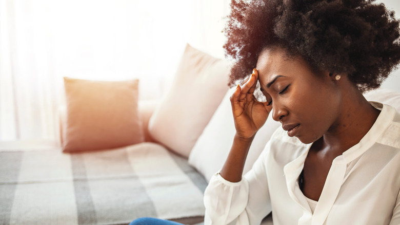 A woman deals with a chronic headache