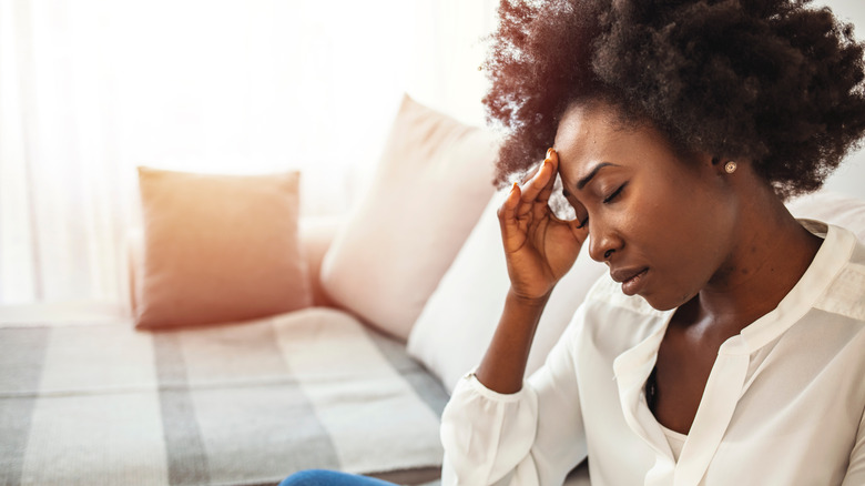 A woman deals with a chronic headache