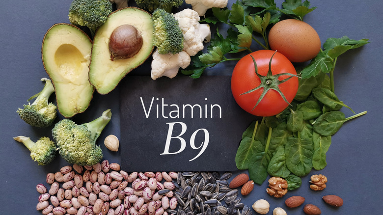 vitamin B9 signage surrounded by food