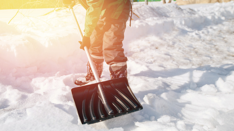 man shoveling snow