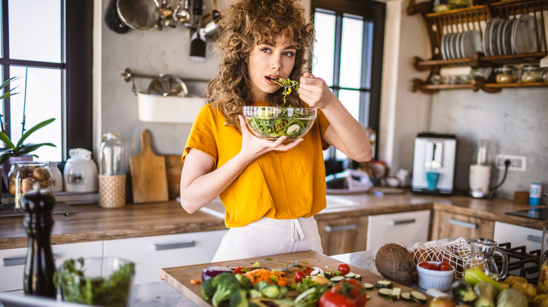 Woman eating vegetarian food