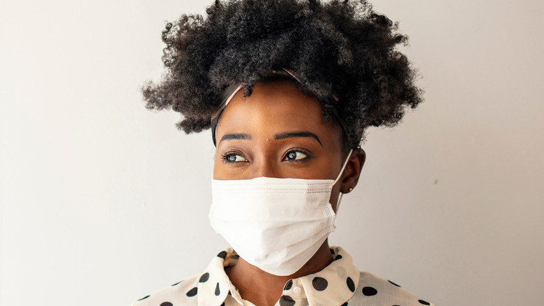 black woman wearing face mask