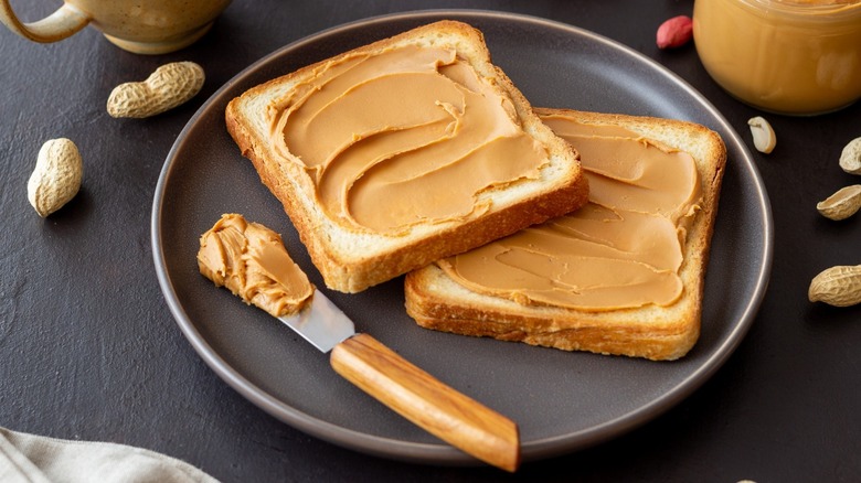 peanut butter on bread slices
