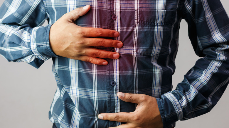 Person suffering from acid reflux